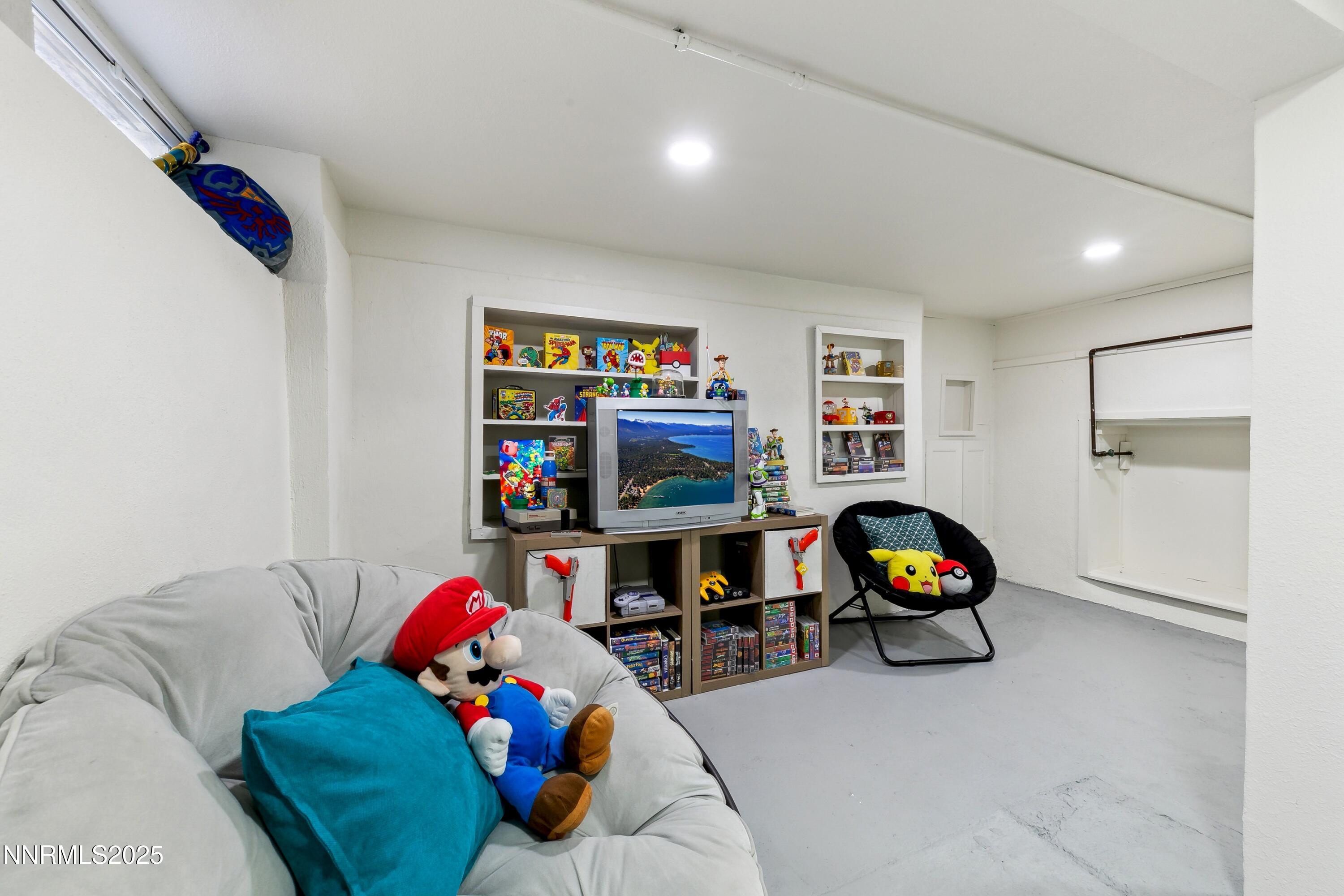 728 West Pueblo Street Reno, NV 89509 - Photo 22 of 33 a living room with furniture and a flat screen tv