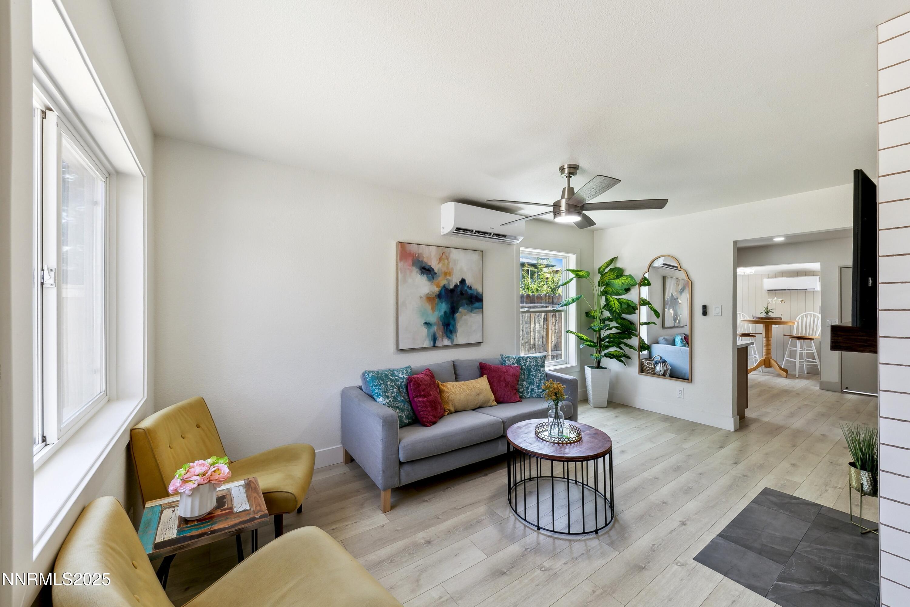 728 West Pueblo Street Reno, NV 89509 - Photo 23 of 33 a living room with furniture and a large window