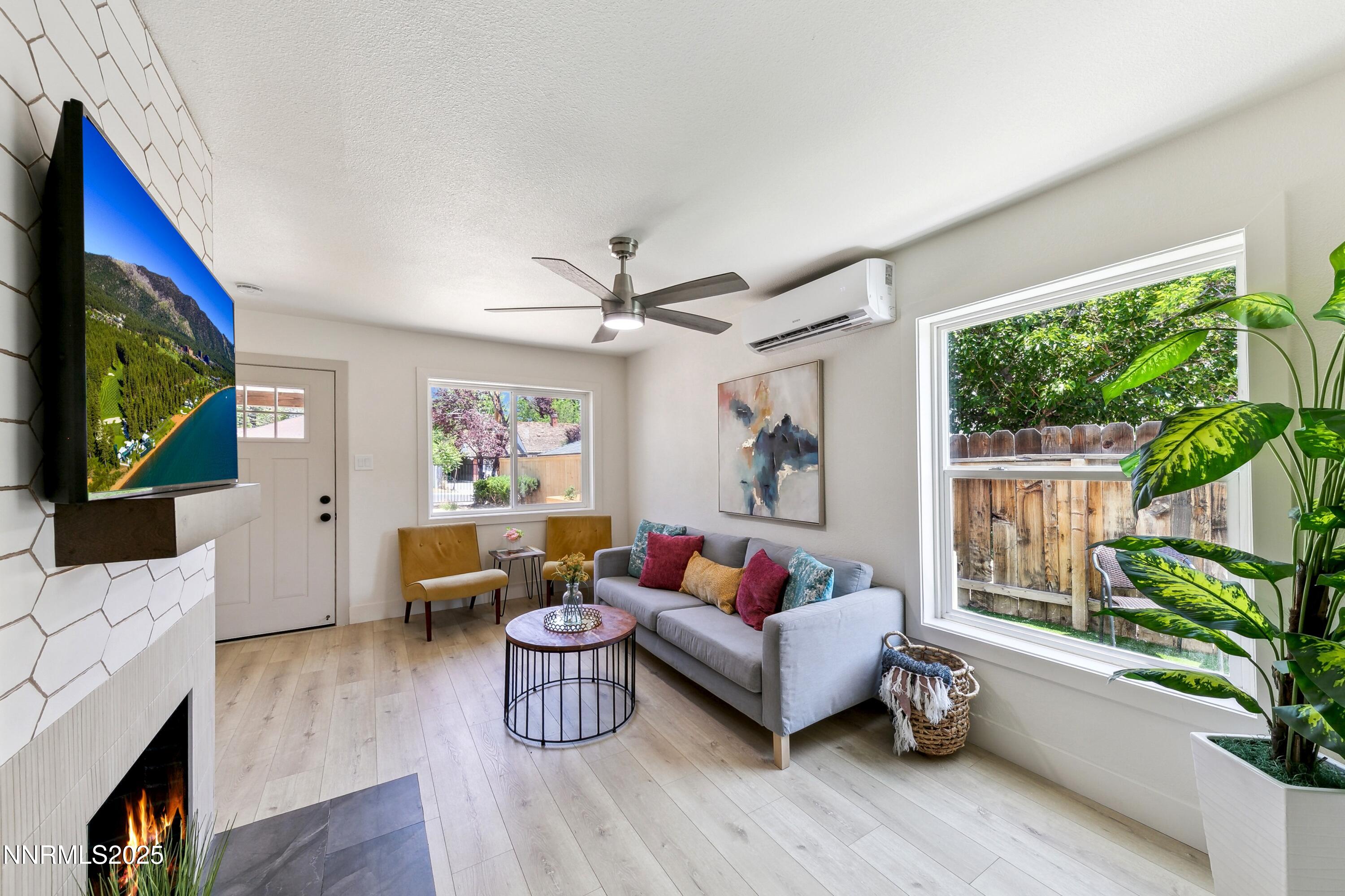 728 West Pueblo Street Reno, NV 89509 - Photo 25 of 33 a living room with furniture and a flat screen tv