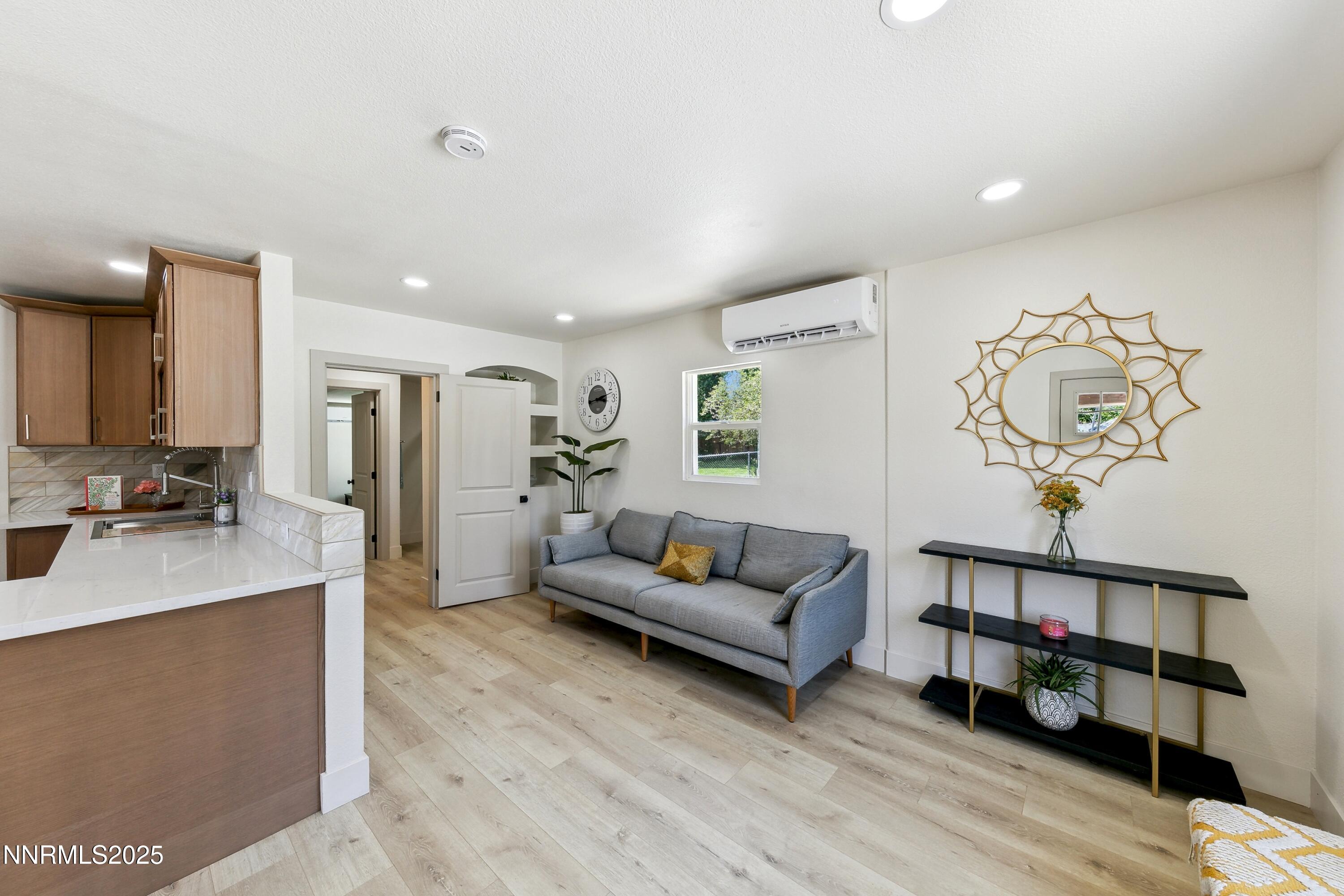 728 West Pueblo Street Reno, NV 89509 - Photo 9 of 33 a living room with furniture and a wooden floor