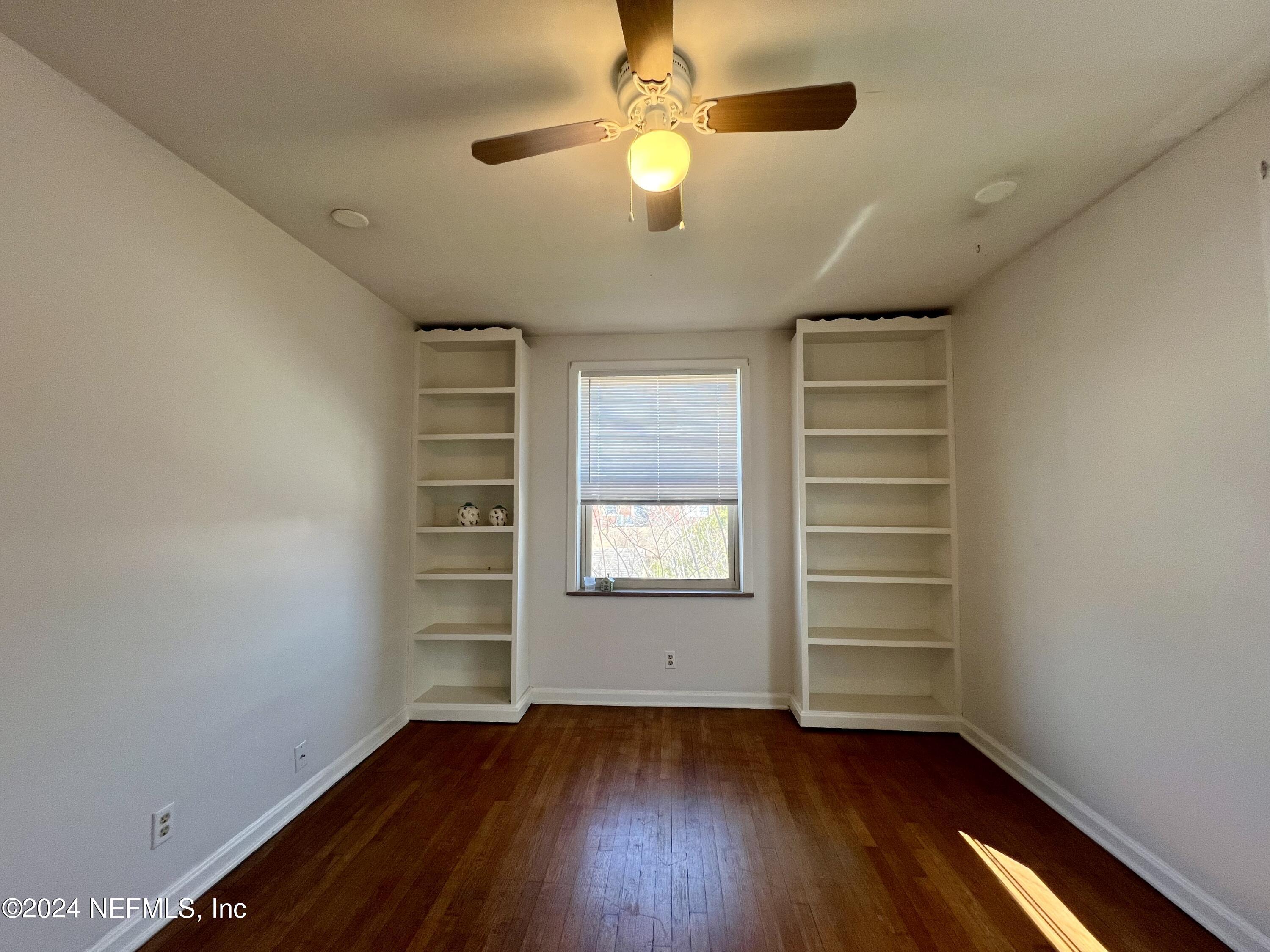 1781 River Road, Unit 4 Jacksonville, FL 32207 - Photo 17 of 24 wooden floor in an empty room with a window