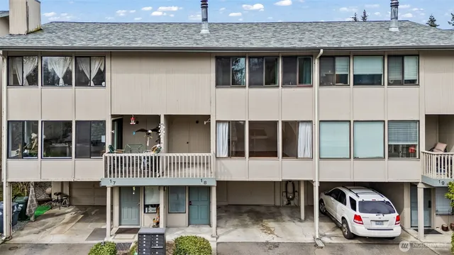 a front view of a building with balcony