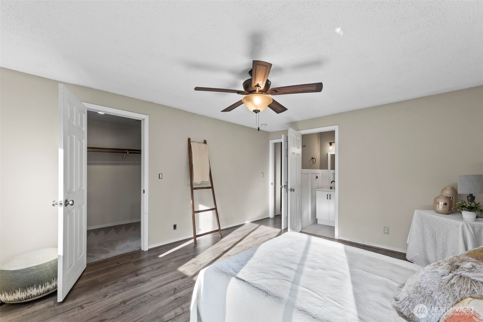 17303 Spanaway Loop Road South, Unit 18 Spanaway, WA 98387 - Photo 14 of 33 a bedroom with a bed and a ceiling fan
