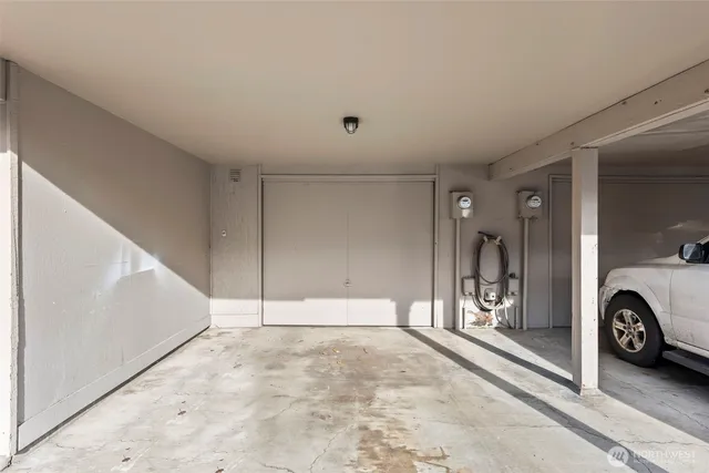 an aerial view of a house with a lake view