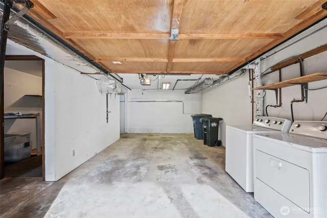 a view of a swimming pool with lounge chairs