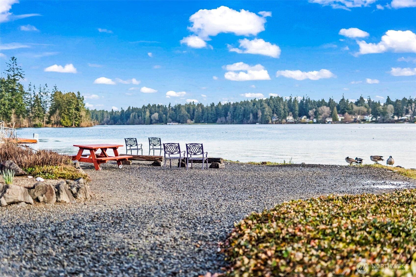 17303 Spanaway Loop Road South, Unit 18 Spanaway, WA 98387 - Photo 26 of 33 a view of a lake with outdoor space