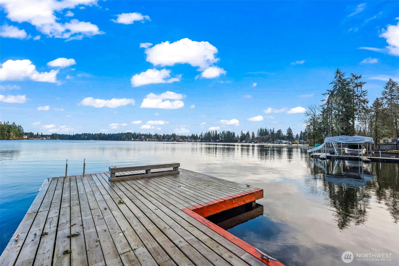 17303 Spanaway Loop Road South, Unit 18 Spanaway, WA 98387 - Photo 28 of 33 a view of a lake with outdoor seating