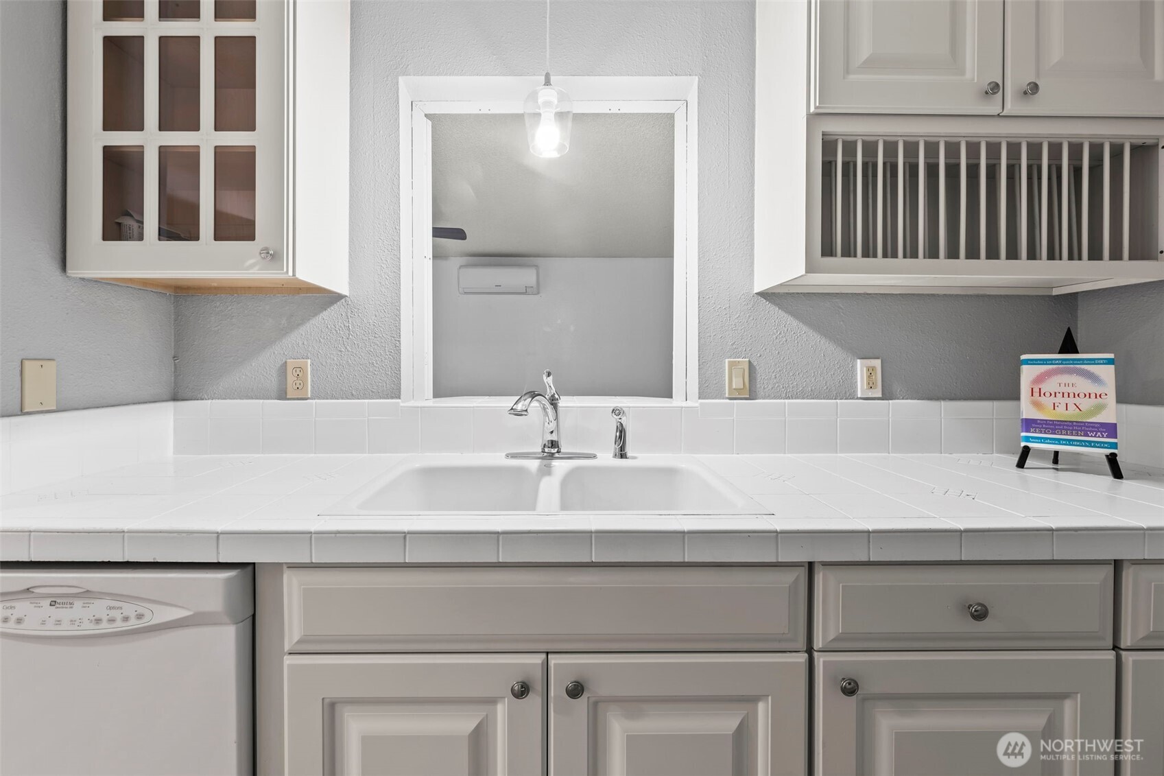 17303 Spanaway Loop Road South, Unit 18 Spanaway, WA 98387 - Photo 7 of 33 a bathroom with a sink and a mirror