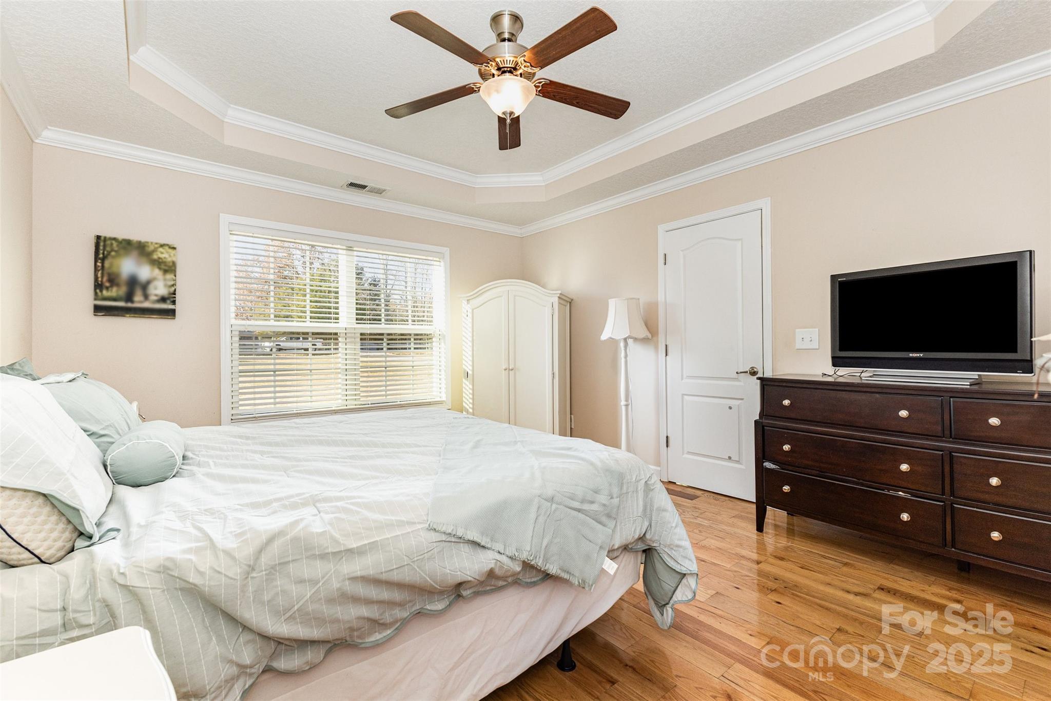 439 Pamela Road York, SC 29745 - Photo 10 of 35 a bedroom with a bed and a flat screen tv