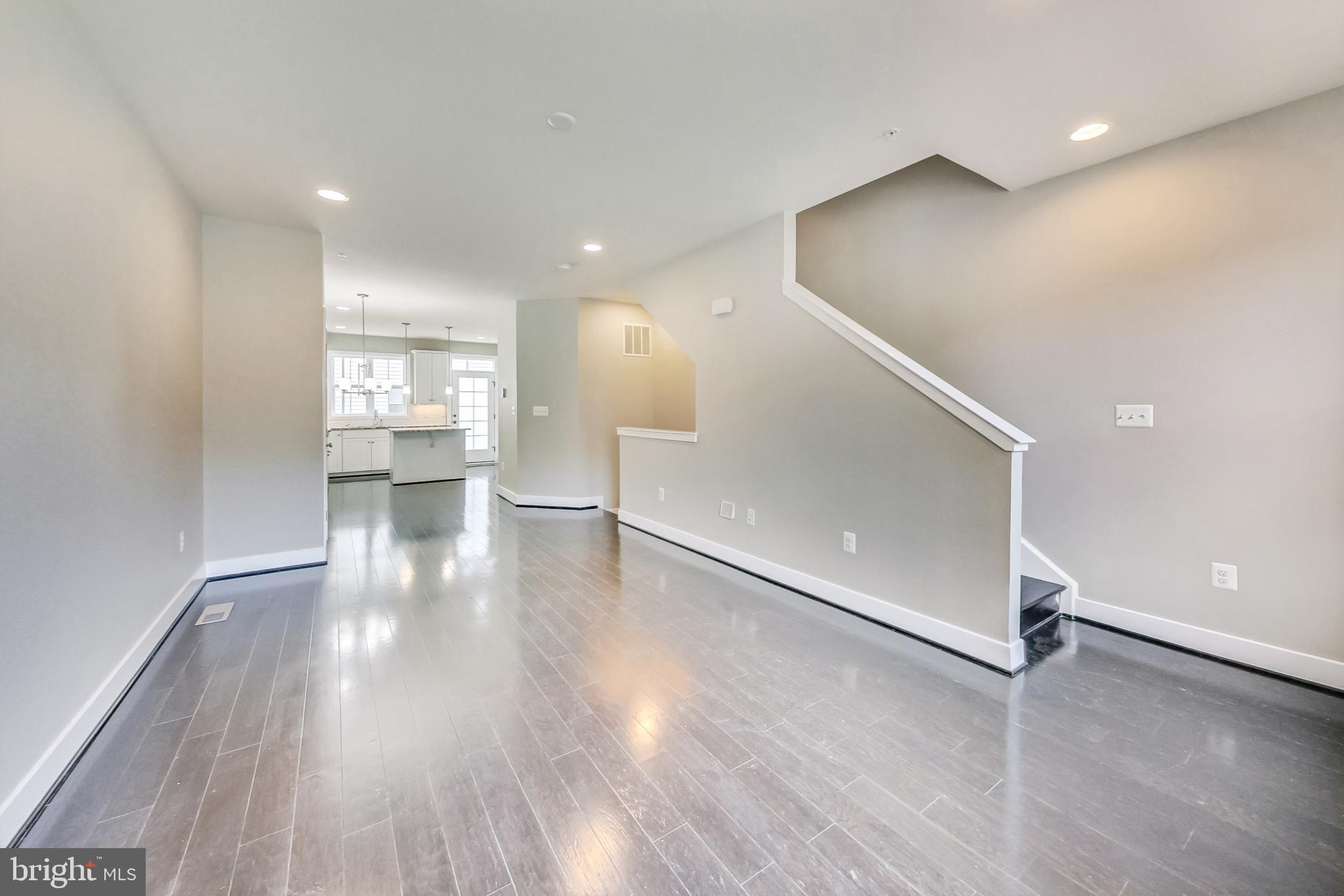 12609 Macaulay Street Silver Spring, MD 20906 - Photo 15 of 38 a view of a livingroom with wooden floor