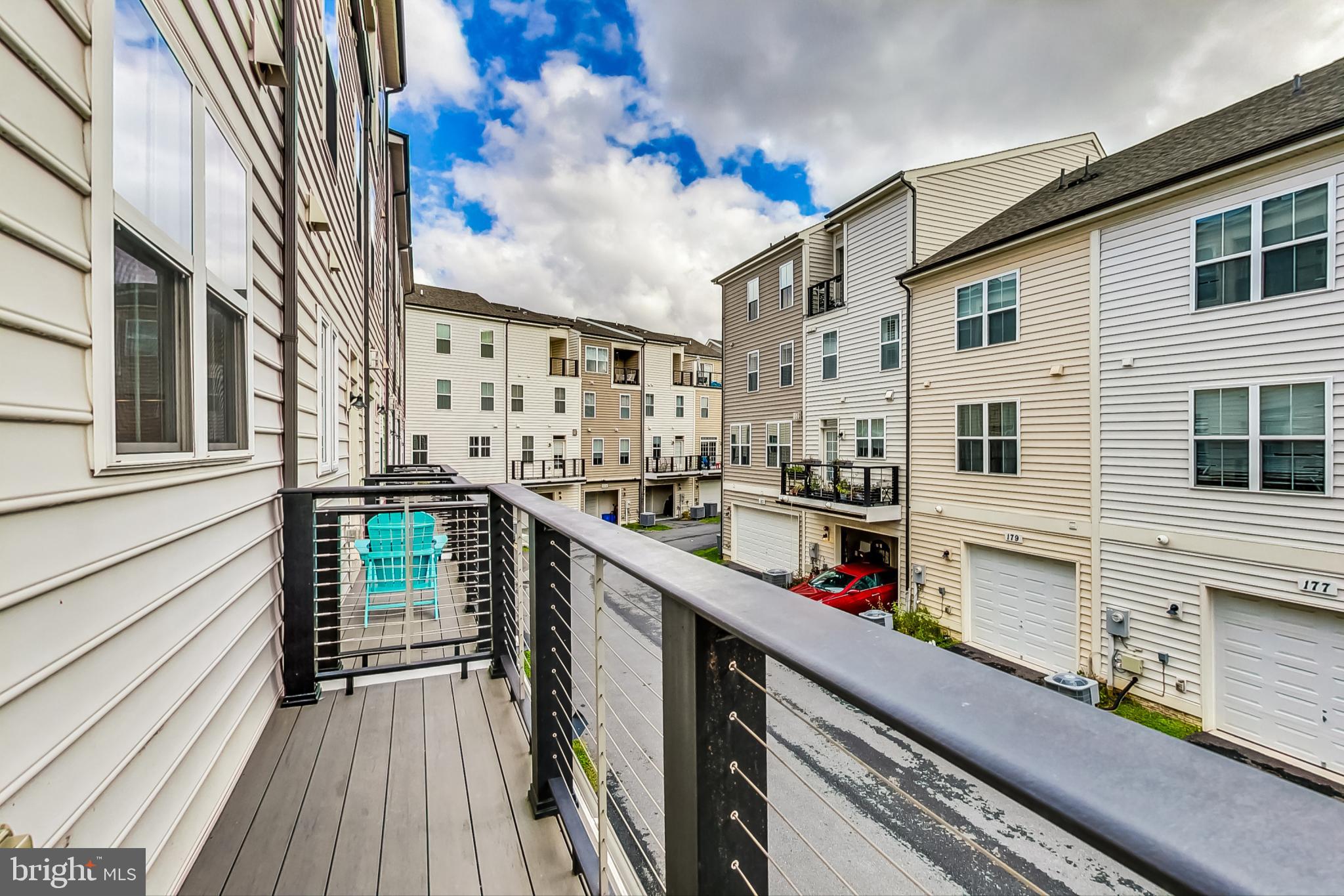 12609 Macaulay Street Silver Spring, MD 20906 - Photo 18 of 38 a view of balcony with furniture and wooden floor