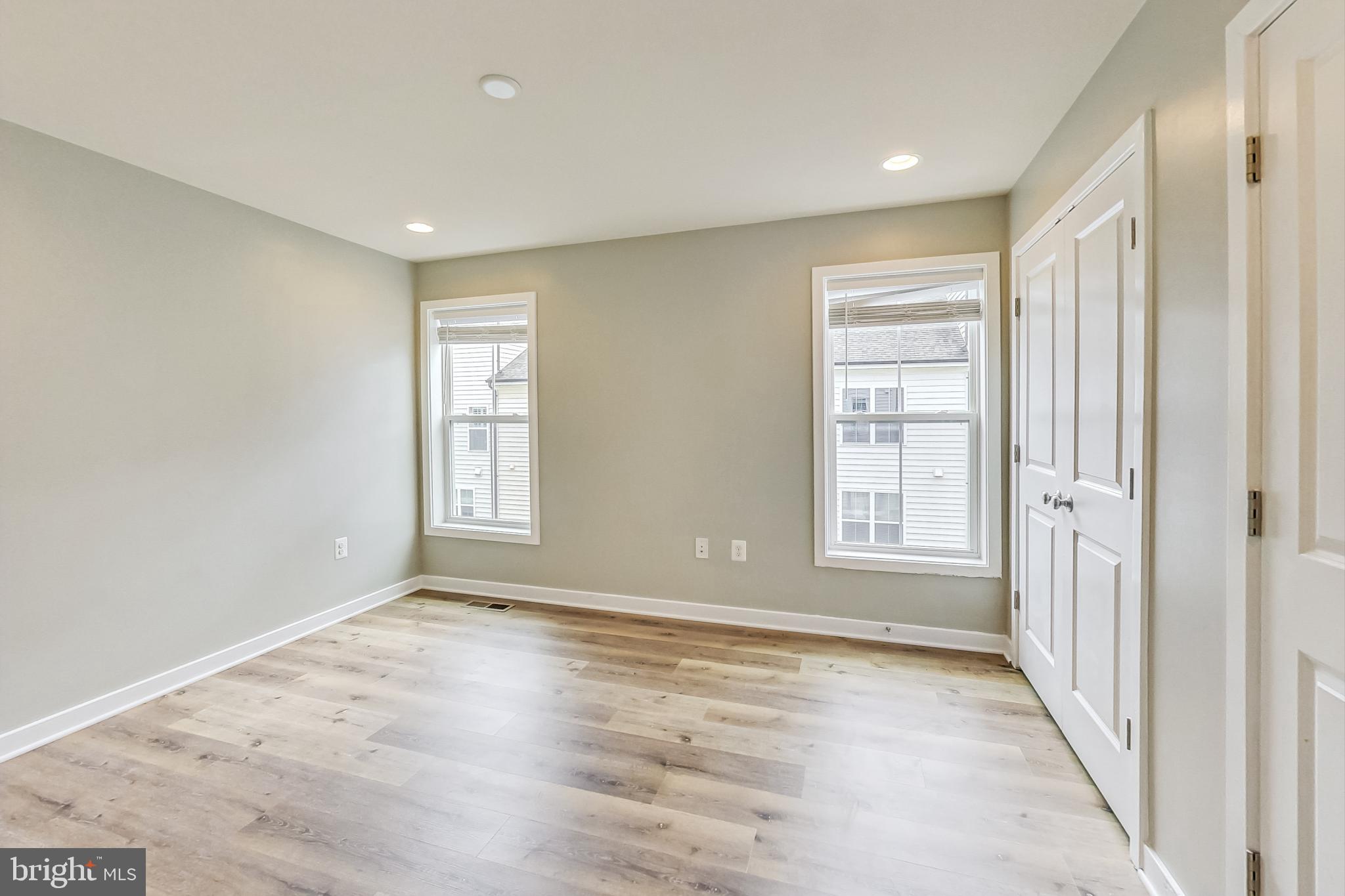 12609 Macaulay Street Silver Spring, MD 20906 - Photo 20 of 38 a view of an empty room with a window