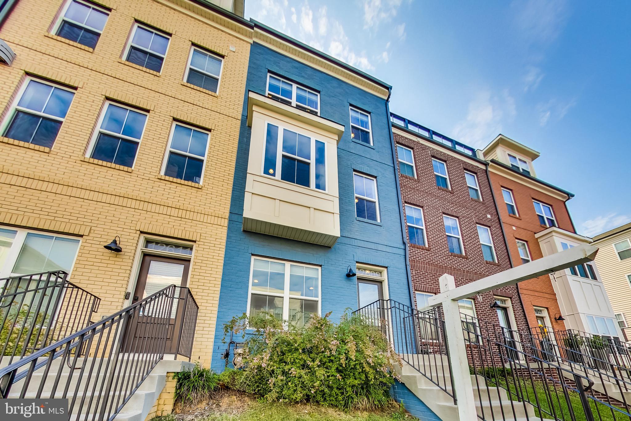12609 Macaulay Street Silver Spring, MD 20906 - Photo 3 of 38 a front view of a multi story building