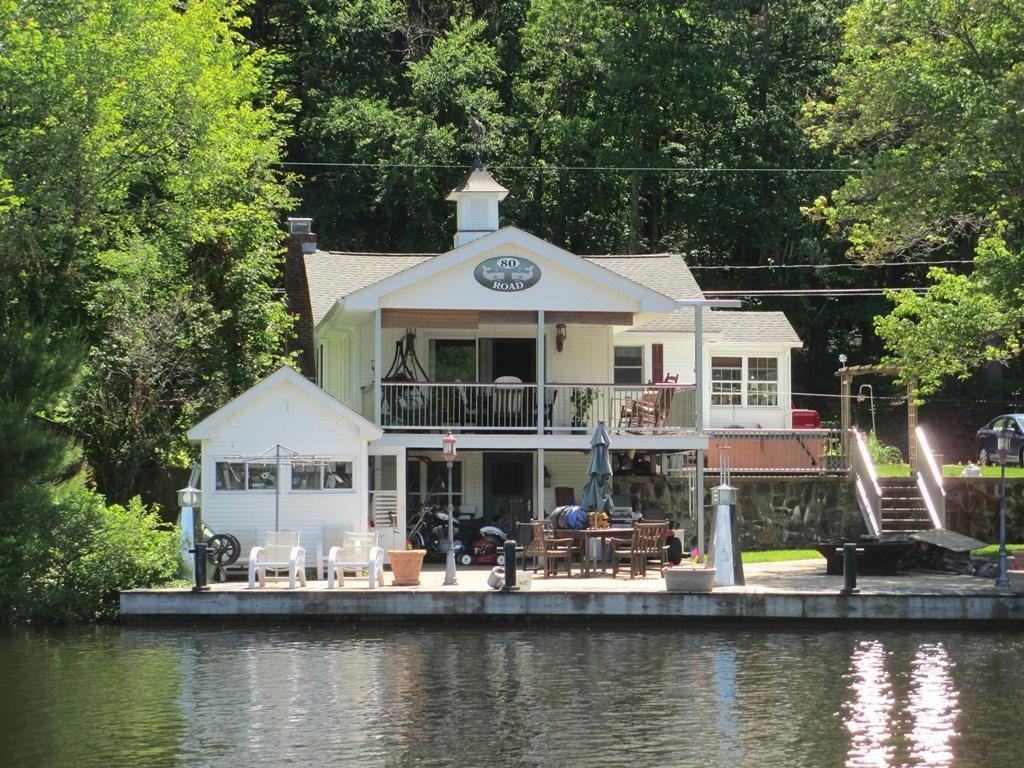 80 Wales Road Stafford, CT 06076 - Photo 1 of 1 a front view of a house with a ocean view