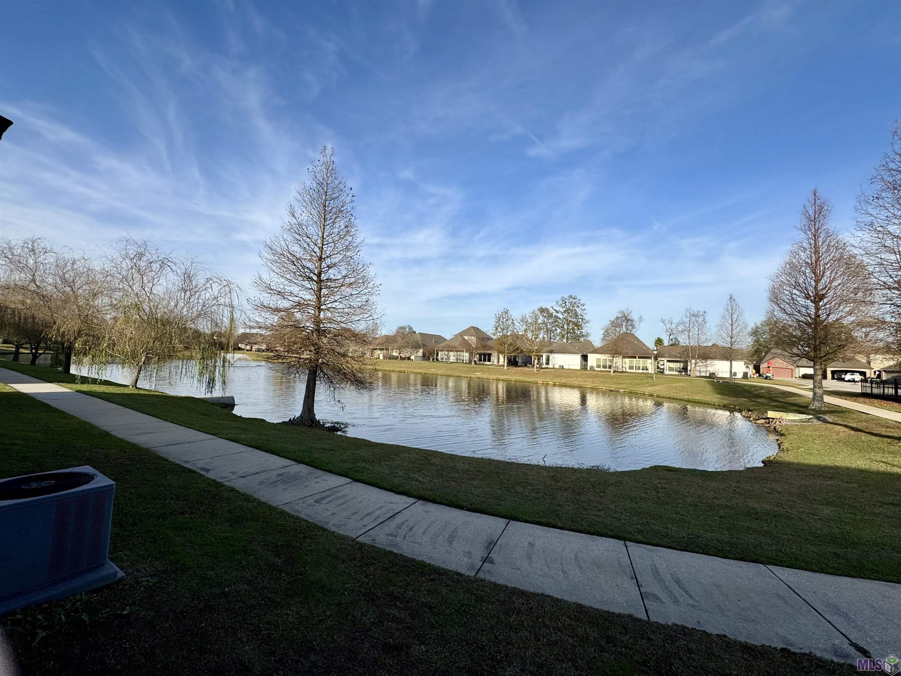 18019 Spring Creek Drive Baton Rouge, LA 70817 - Photo 15 of 16 Walking Path around Lake