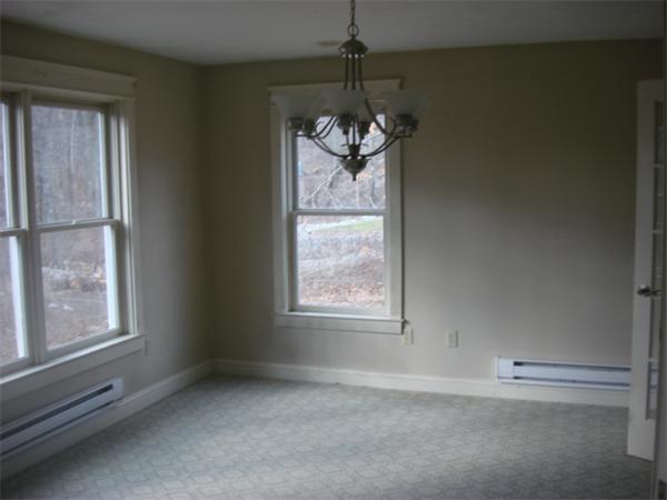 1 Flaxfield Road Dudley, MA 01571 - Photo 3 of 9 a view of a windows and chandelier in a room