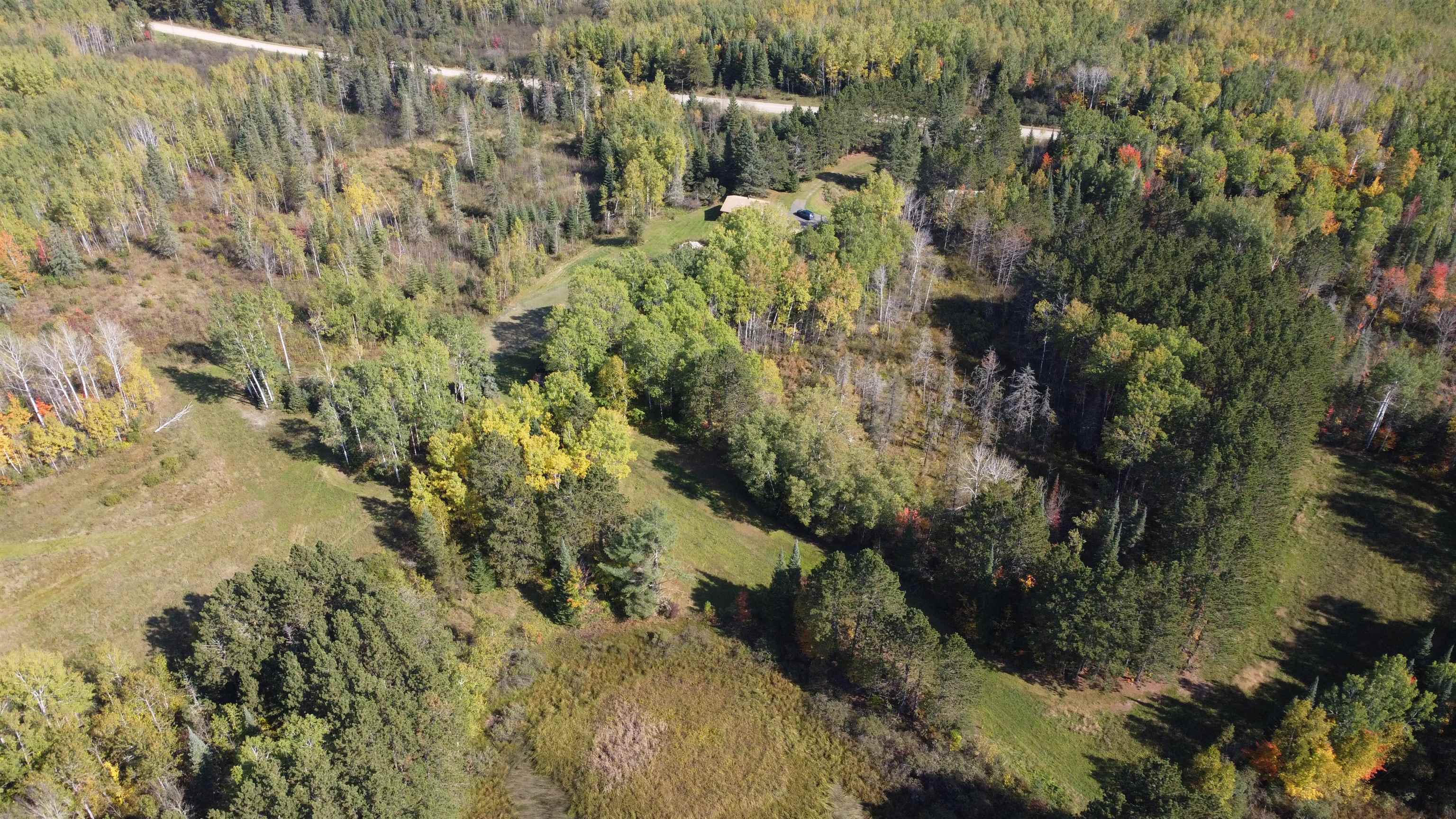 6821 Barrett Road Chisholm, MN 55719 - Photo 23 of 34 View of property location featuring a forest