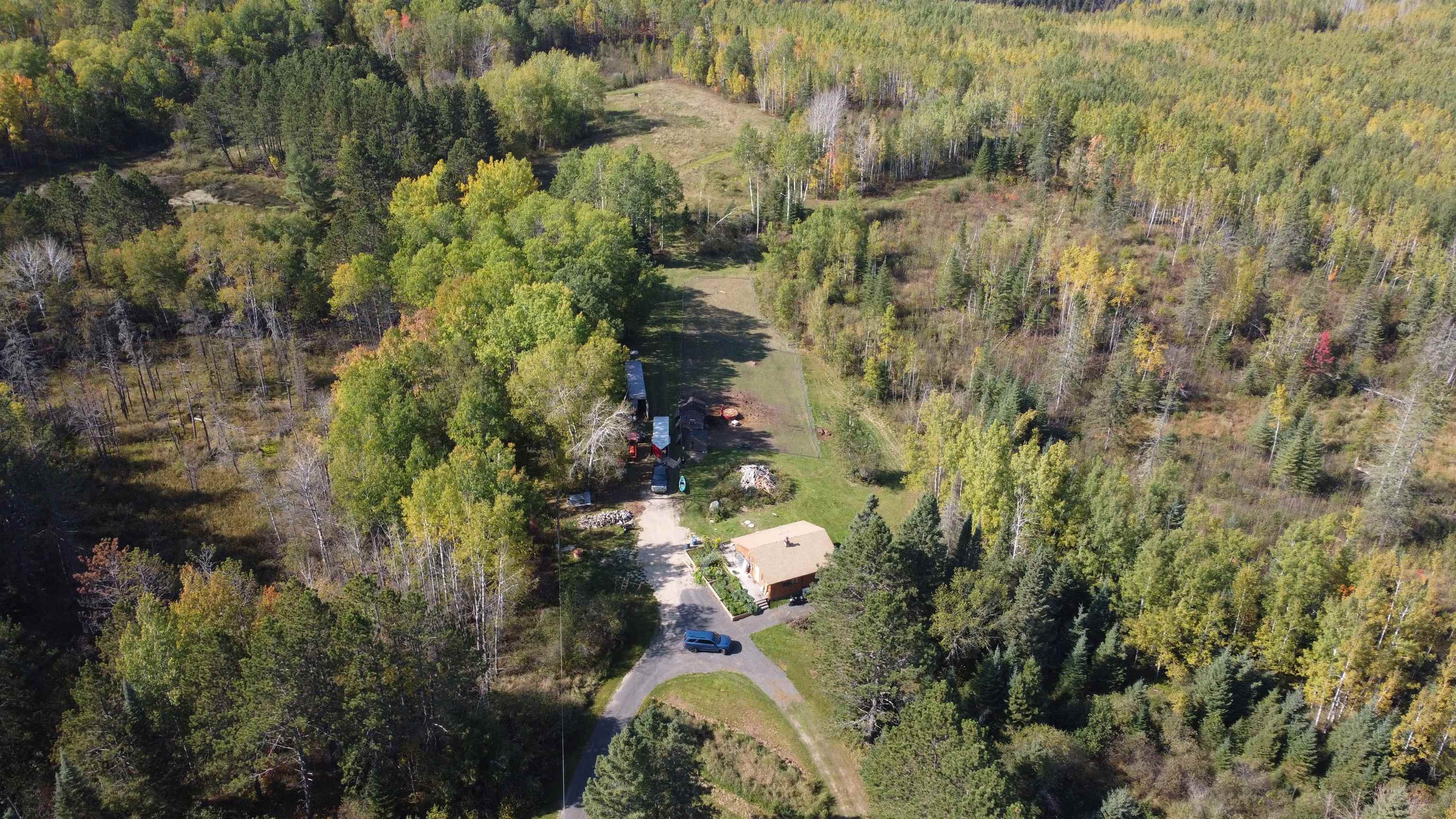 6821 Barrett Road Chisholm, MN 55719 - Photo 29 of 34 View of property location featuring a forest