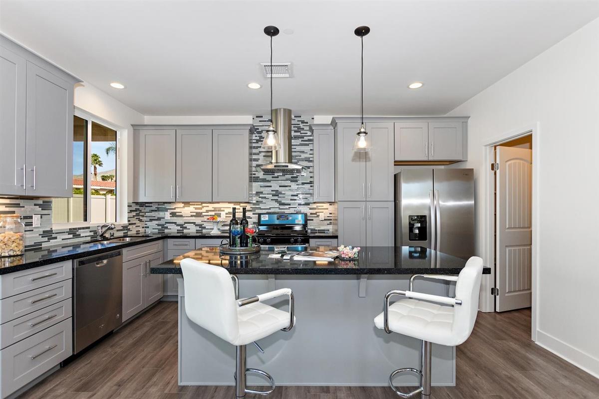 9711 Capiland Road Desert Hot Springs, CA 92240 - Photo 13 of 33 09-Kitchen