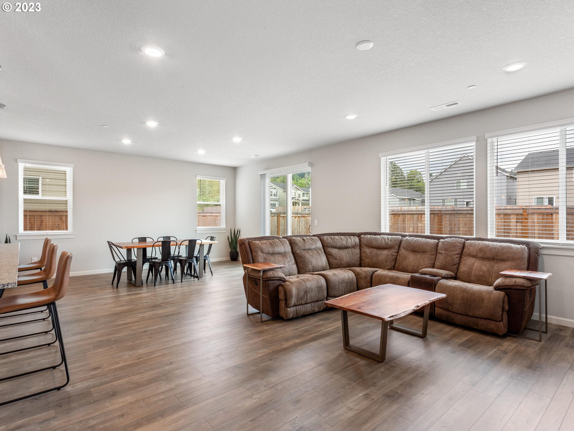 6852 North 89th Loop Camas, WA 98607 - Photo 14 of 38 a living room with furniture and wooden floor