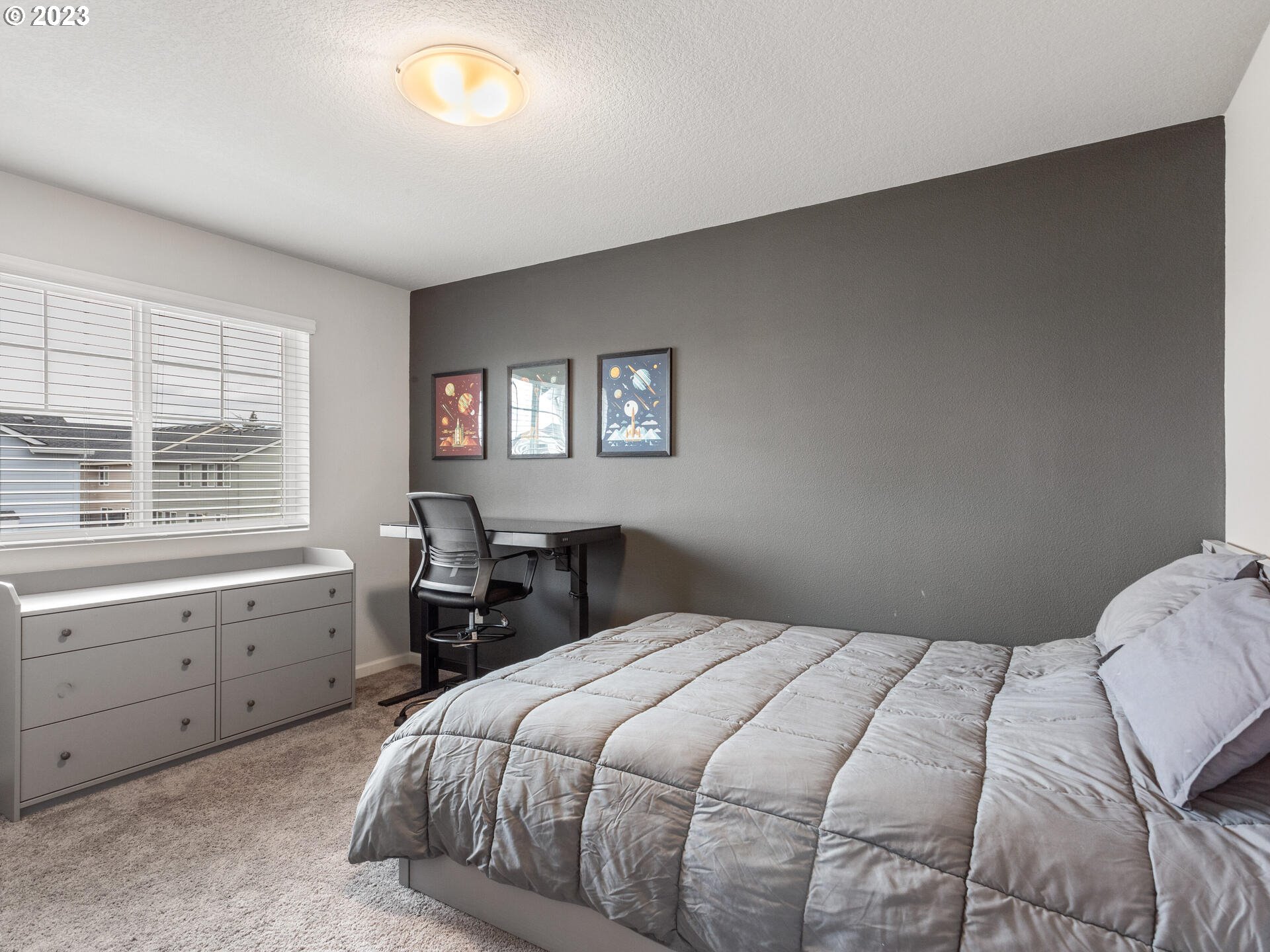 6852 North 89th Loop Camas, WA 98607 - Photo 25 of 38 a bedroom with a bed and a window