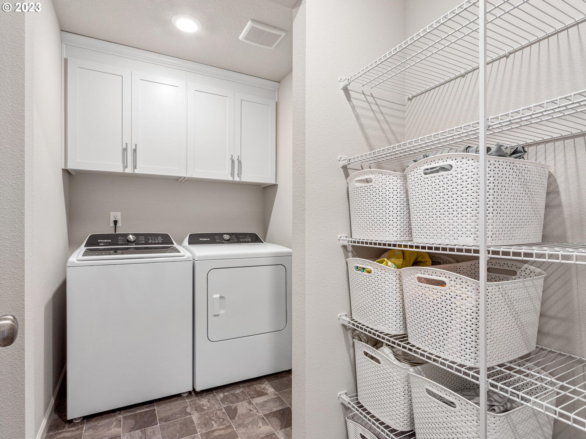 6852 North 89th Loop Camas, WA 98607 - Photo 29 of 38 a utility room with dryer and washer