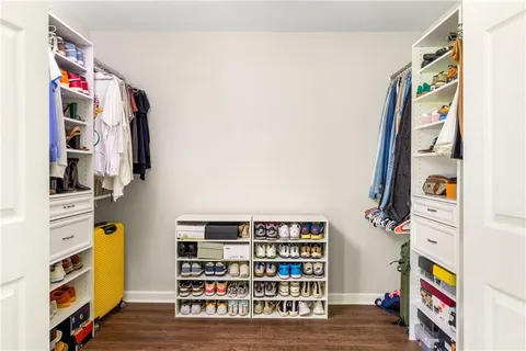 a bathroom with a bathtub and shower
