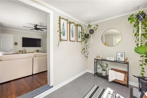 a bathroom with a toilet a sink and a mirror