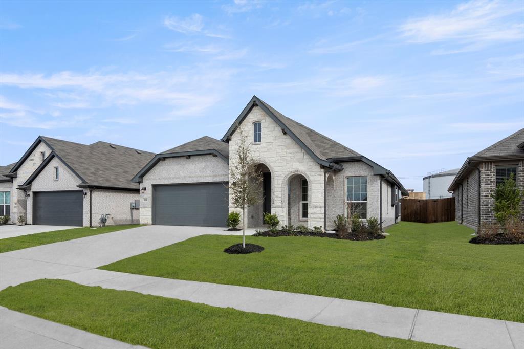 810 Misty Lane Cleburne, TX 76033 - Photo 29 of 30 a front view of house with yard and green space