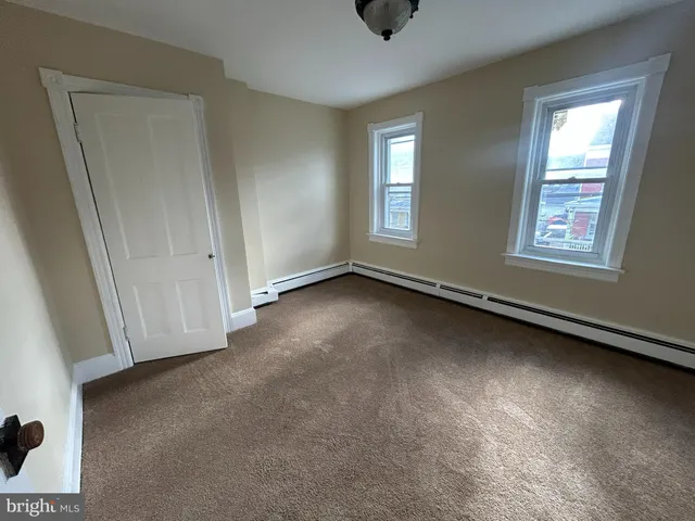 an empty room with a door