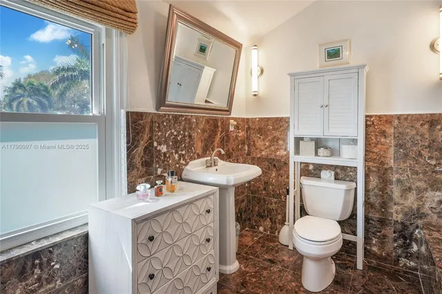 a building with potted plants in front of it