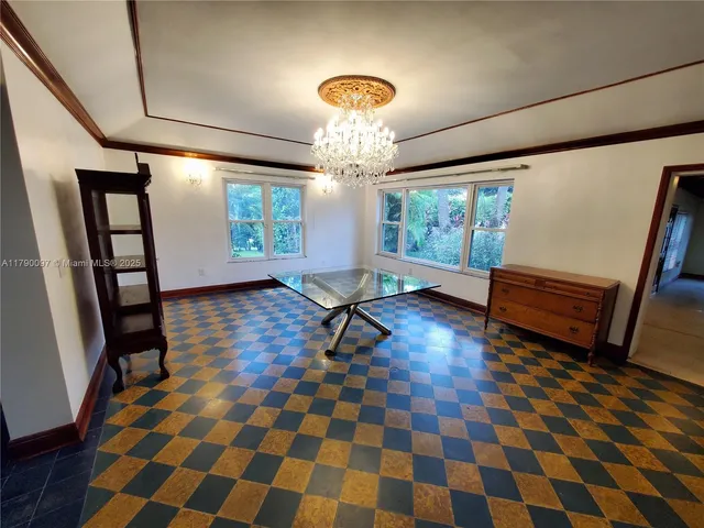 a view of a livingroom with furniture window and outside view