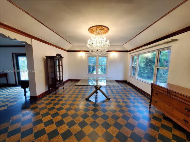 an outdoor space with furniture and umbrella