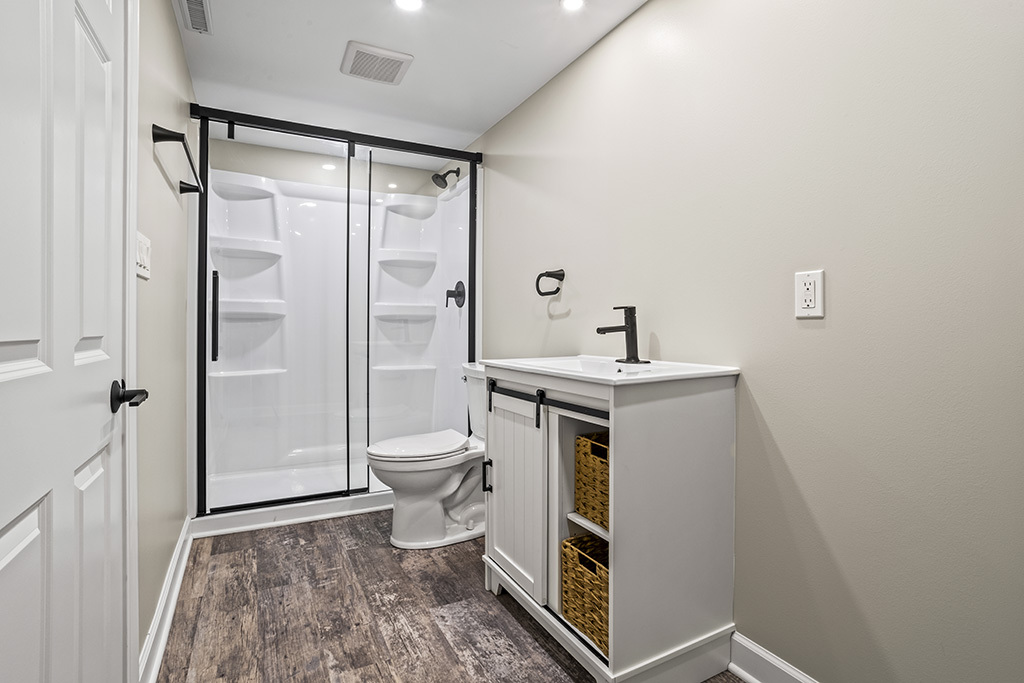 17528 Woodbrook Lane Lockport, IL 60441 - Photo 14 of 17 a bathroom with a sink toilet and shower