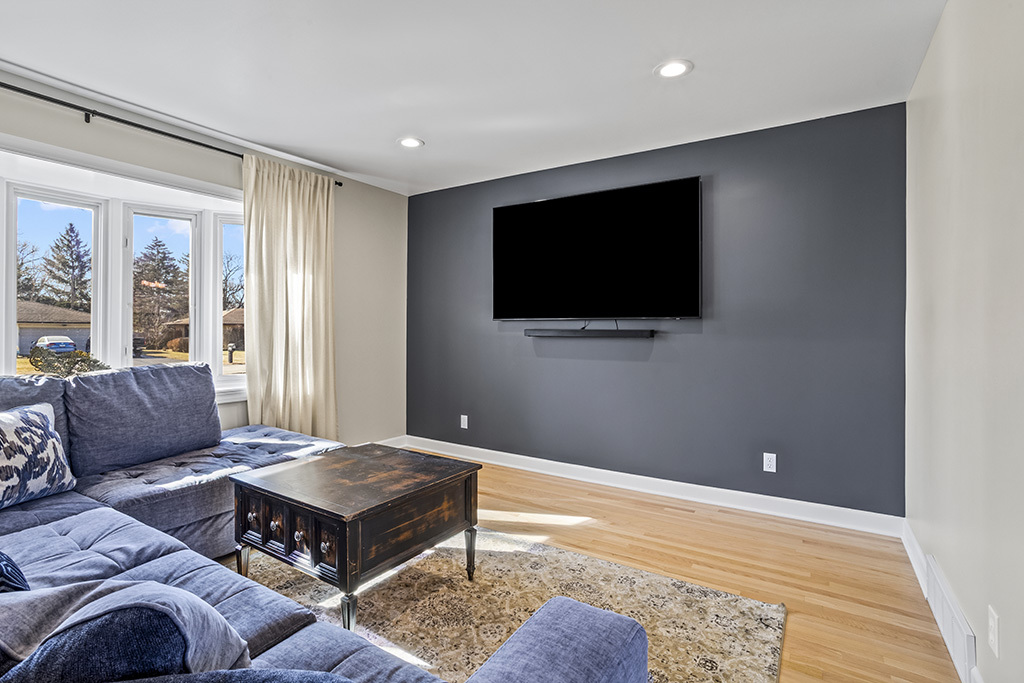 17528 Woodbrook Lane Lockport, IL 60441 - Photo 4 of 17 a living room with furniture and a flat screen tv
