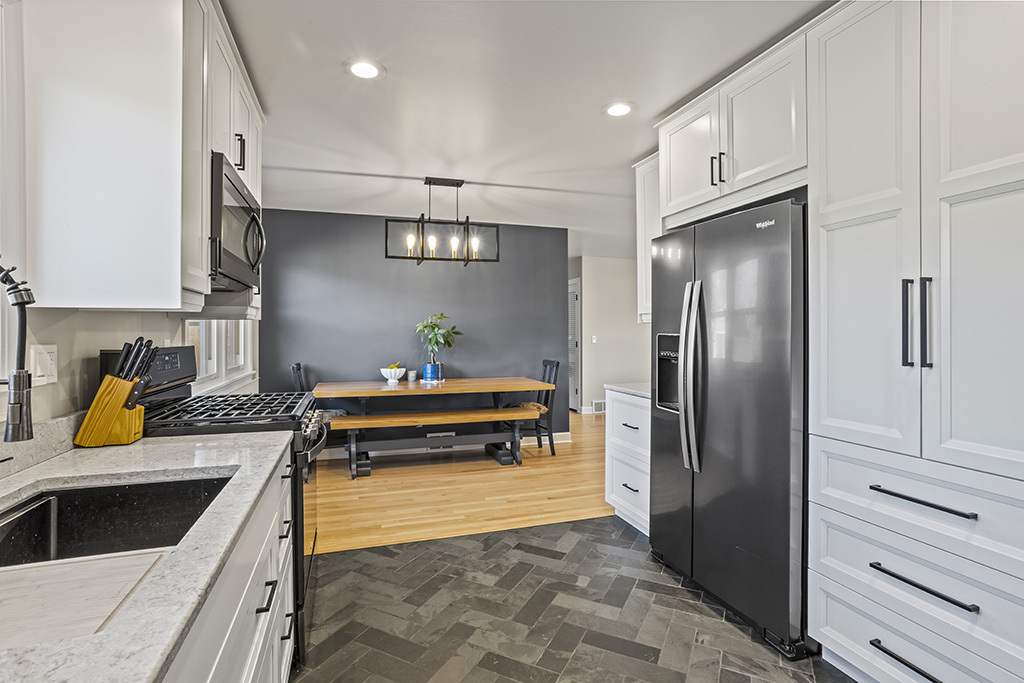 17528 Woodbrook Lane Lockport, IL 60441 - Photo 6 of 17 a kitchen with stainless steel appliances granite countertop a refrigerator and a sink