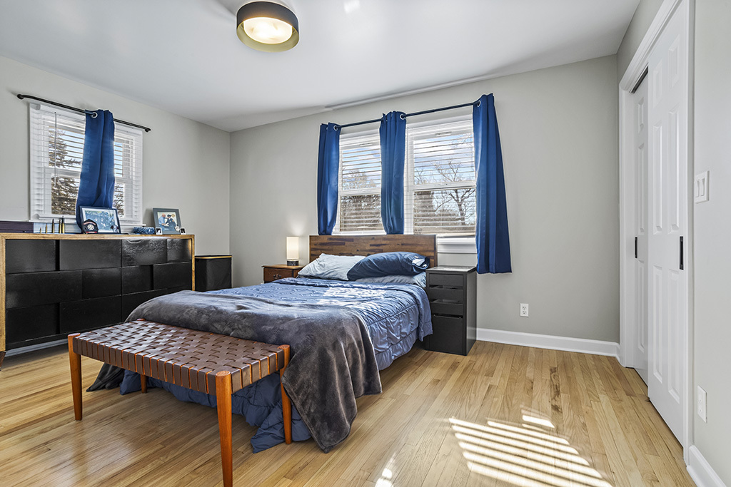 17528 Woodbrook Lane Lockport, IL 60441 - Photo 8 of 17 a bedroom with a bed and a table