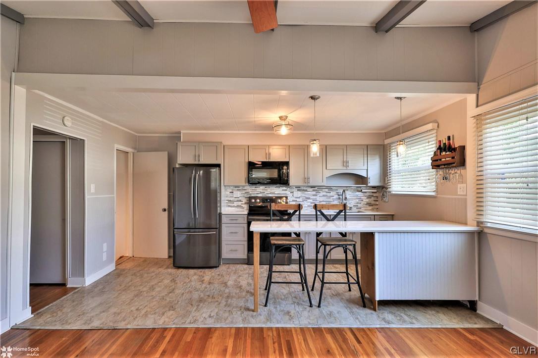 1522 Elayne Street Bethlehem, PA 18017 - Photo 5 of 20 a kitchen with stainless steel appliances granite countertop a refrigerator and a stove top oven