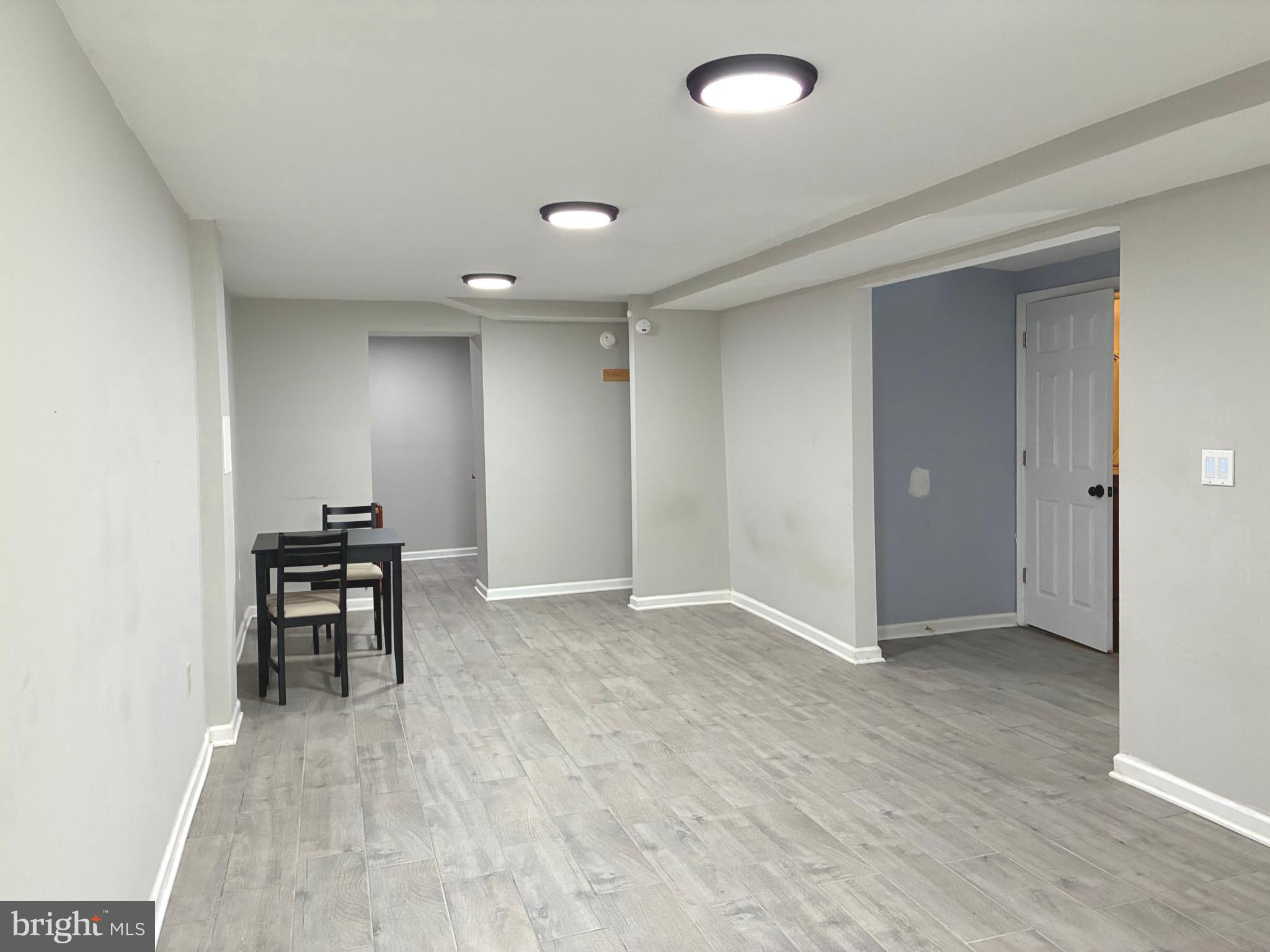 5112 Hollywood Road College Park, MD 20740 - Photo 24 of 28 Lower Level Living/Dining Area