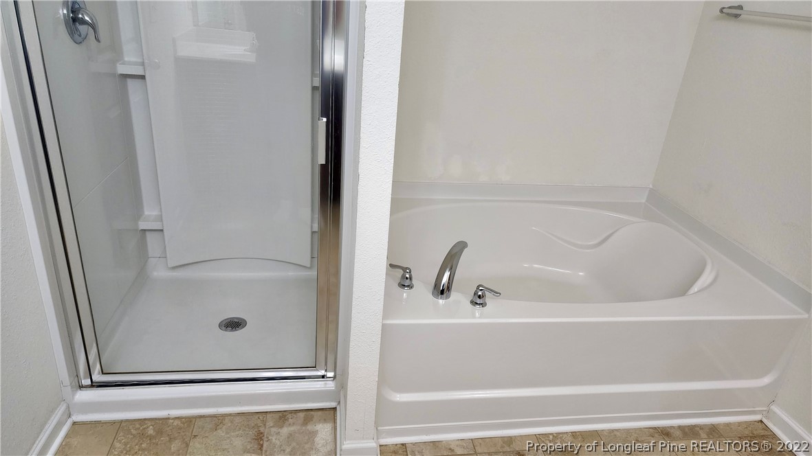 286 Botanical Court Bunnlevel, NC 28323 - Photo 13 of 39 a bathroom with bathtub