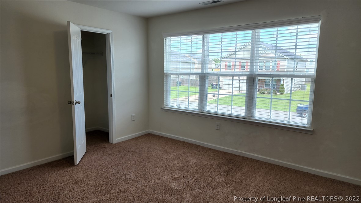 286 Botanical Court Bunnlevel, NC 28323 - Photo 15 of 39 an empty room with a window