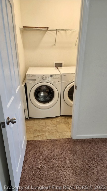 286 Botanical Court Bunnlevel, NC 28323 - Photo 24 of 39 a utility room with dryer and washer