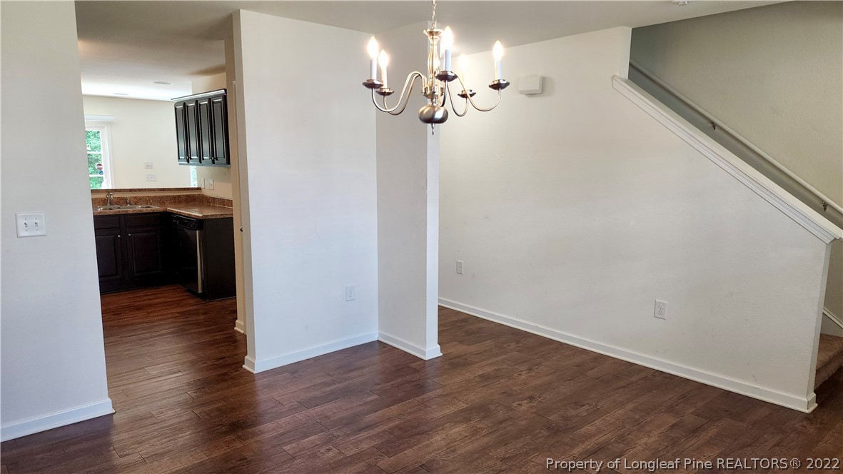 286 Botanical Court Bunnlevel, NC 28323 - Photo 25 of 39 a view of a livingroom with wooden floor