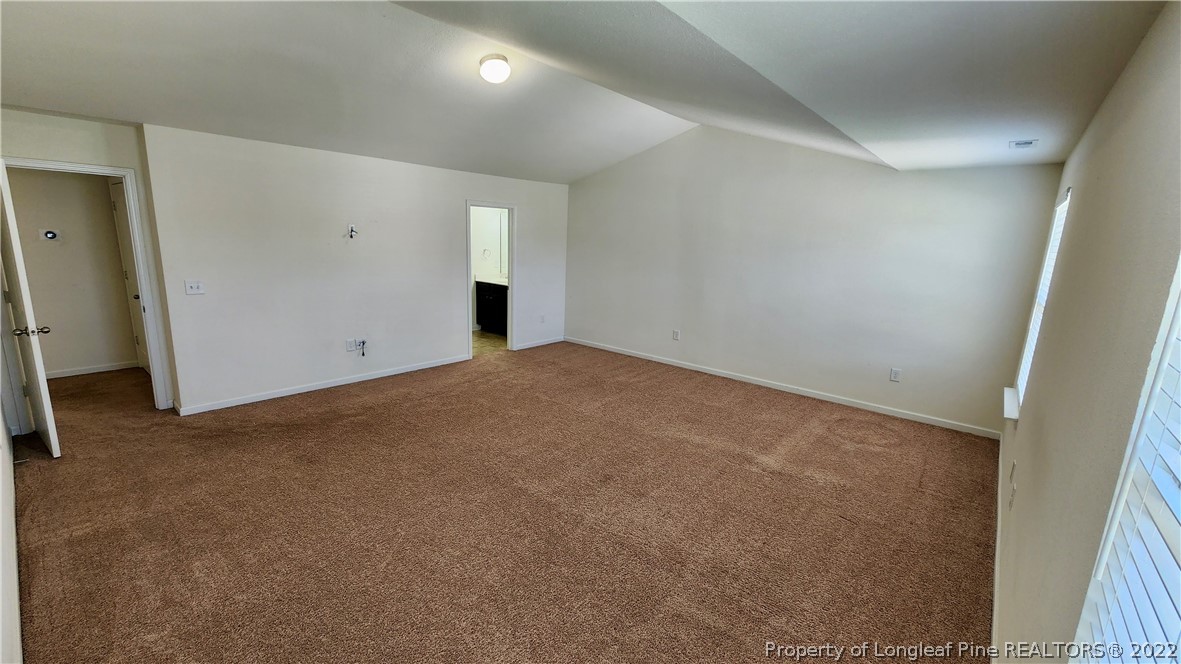 286 Botanical Court Bunnlevel, NC 28323 - Photo 26 of 39 an empty room with closet area