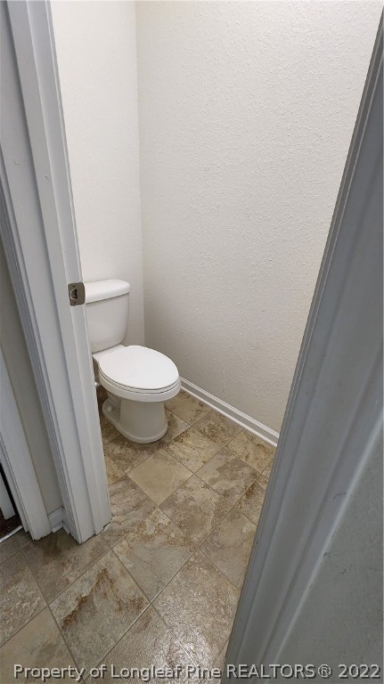 286 Botanical Court Bunnlevel, NC 28323 - Photo 10 of 39 a bathroom with a toilet and a sink