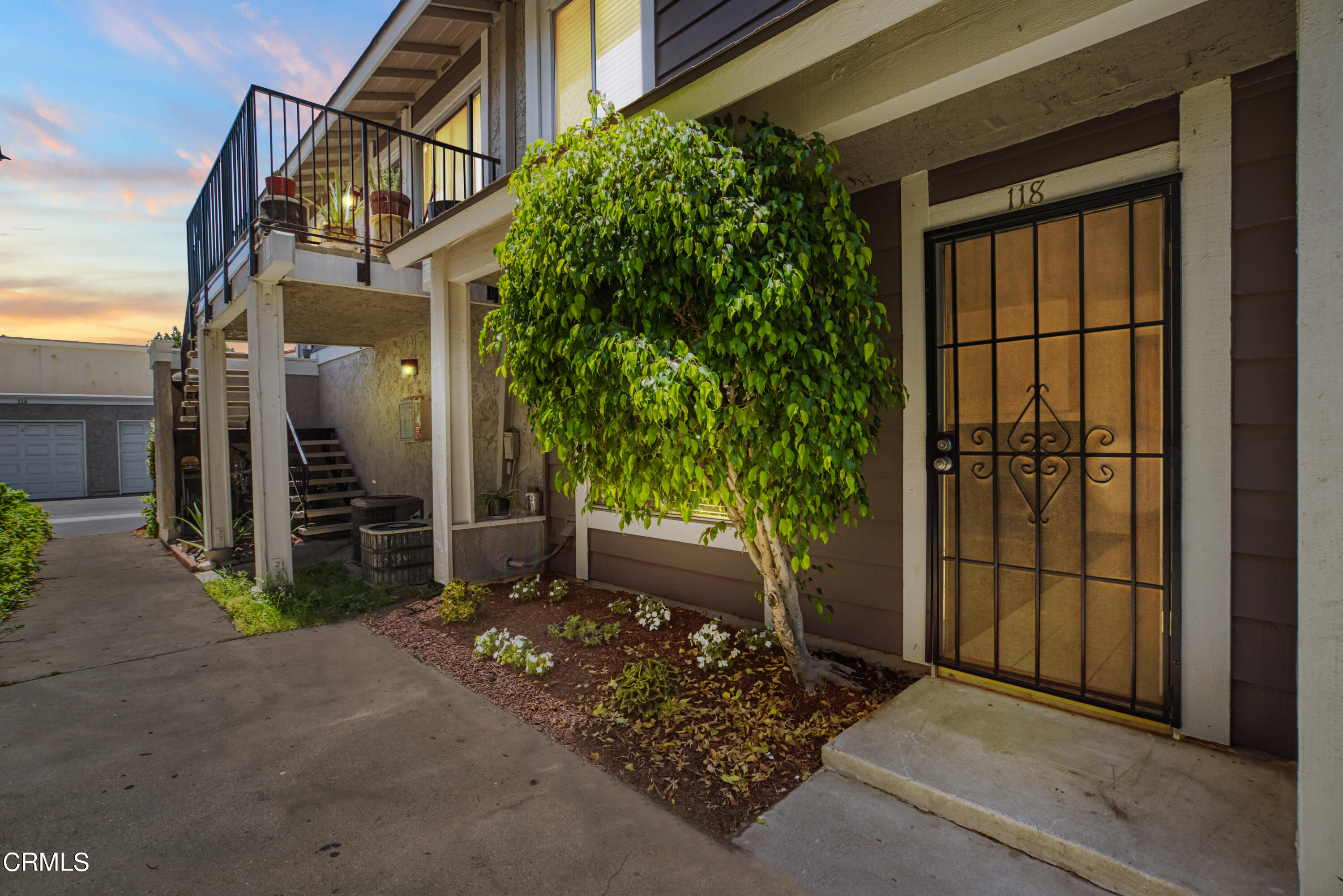 510 Spring Road, Unit 118 Moorpark, CA 93021 - Photo 1 of 24 a view of a front door and outdoor space