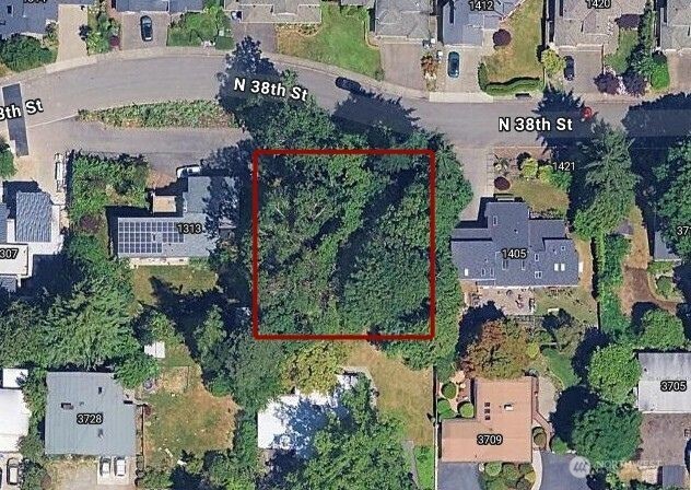 1403 North 38th Street Renton, WA 98056 - Photo 1 of 7 an aerial view of houses with outdoor space