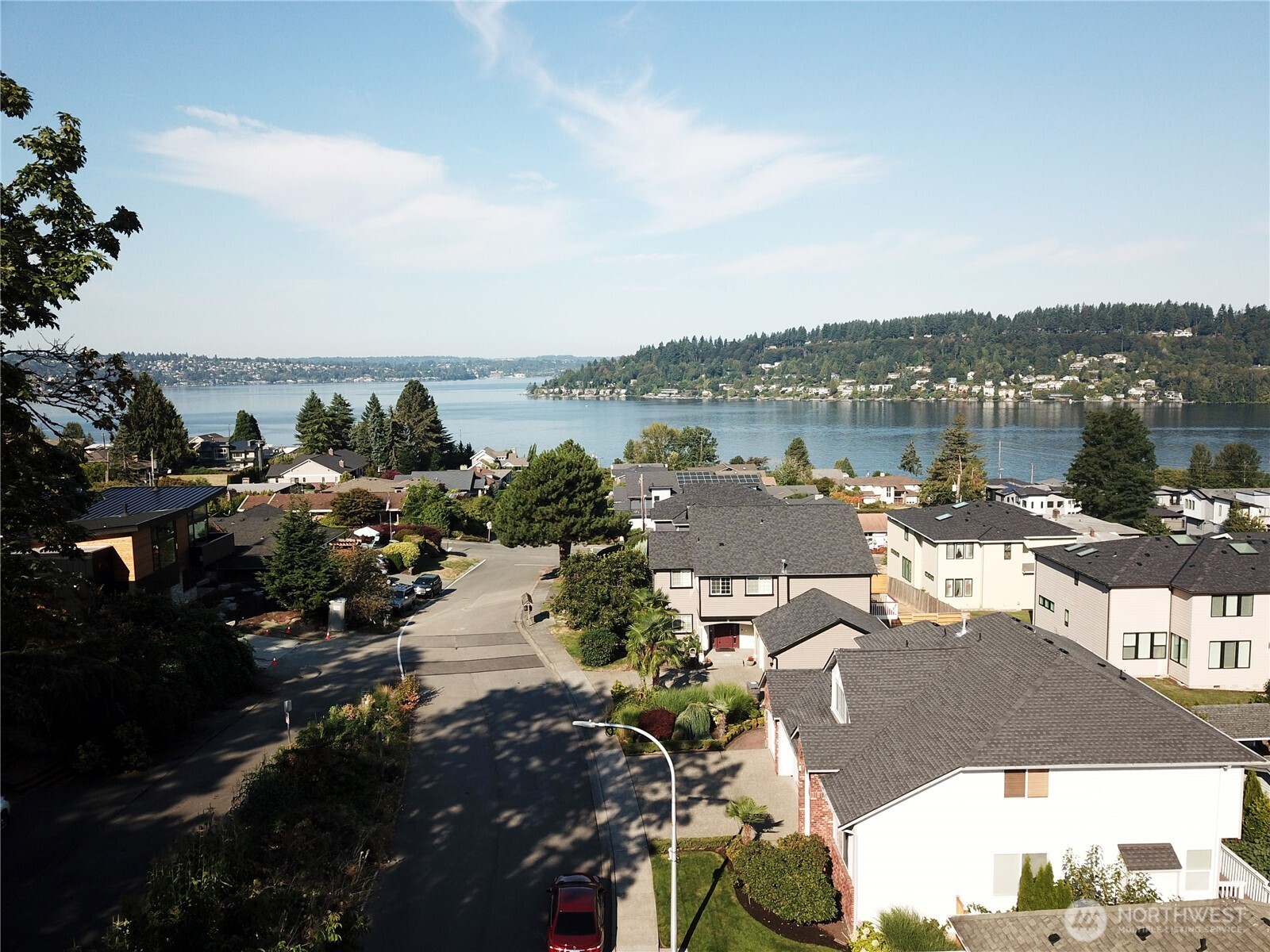 1403 North 38th Street Renton, WA 98056 - Photo 2 of 7 a view of a lake with houses