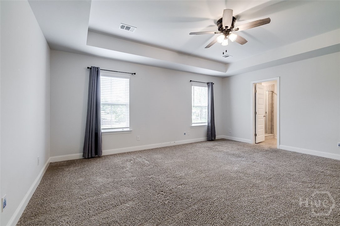 55 Saddlebrush Road Ellabell, GA 31308 - Photo 11 of 50 Currently vacant - Primary bedroom with door to lu