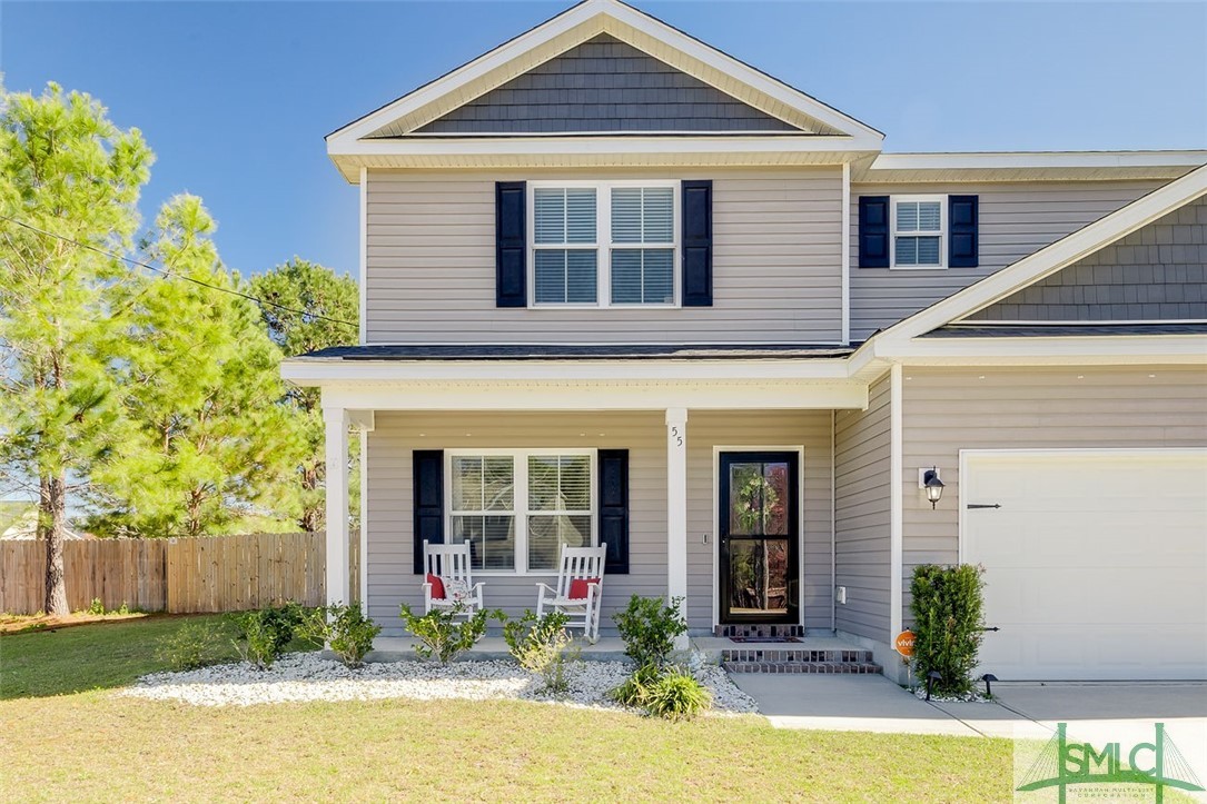 55 Saddlebrush Road Ellabell, GA 31308 - Photo 13 of 50 Rocking chair covered front porch
